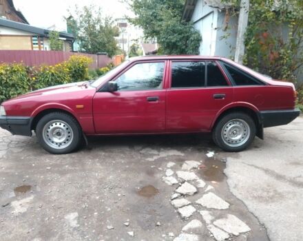 Красный Мазда 626, объемом двигателя 2 л и пробегом 250 тыс. км за 1212 $, фото 3 на Automoto.ua