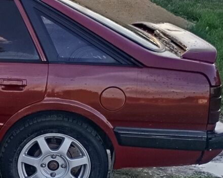 Червоний Мазда 626, об'ємом двигуна 2 л та пробігом 1000 тис. км за 1650 $, фото 2 на Automoto.ua