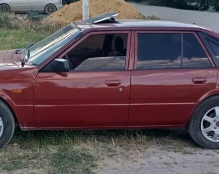 Червоний Мазда 626, об'ємом двигуна 2 л та пробігом 1000 тис. км за 1650 $, фото 1 на Automoto.ua