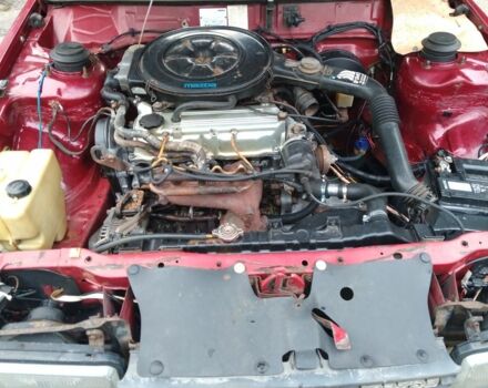 Красный Мазда 626, объемом двигателя 2 л и пробегом 250 тыс. км за 1212 $, фото 5 на Automoto.ua