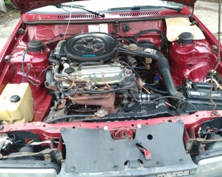 Красный Мазда 626, объемом двигателя 2 л и пробегом 250 тыс. км за 1212 $, фото 4 на Automoto.ua