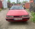 Красный Мазда 626, объемом двигателя 2 л и пробегом 250 тыс. км за 800 $, фото 1 на Automoto.ua