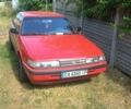Красный Мазда 626, объемом двигателя 2 л и пробегом 231 тыс. км за 2000 $, фото 1 на Automoto.ua