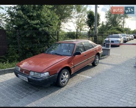 Красный Мазда 626, объемом двигателя 2 л и пробегом 500 тыс. км за 907 $, фото 1 на Automoto.ua