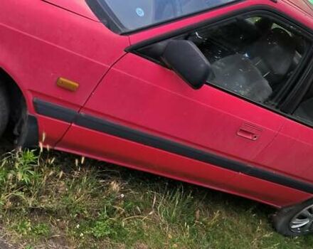 Красный Мазда 626, объемом двигателя 2 л и пробегом 214 тыс. км за 900 $, фото 4 на Automoto.ua