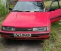 Красный Мазда 626, объемом двигателя 2 л и пробегом 214 тыс. км за 900 $, фото 1 на Automoto.ua
