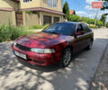 Красный Мазда 626, объемом двигателя 1.84 л и пробегом 238 тыс. км за 1100 $, фото 1 на Automoto.ua