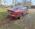 Красный Мазда 626, объемом двигателя 2 л и пробегом 320 тыс. км за 950 $, фото 1 на Automoto.ua