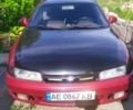 Красный Мазда 626, объемом двигателя 2 л и пробегом 258 тыс. км за 2450 $, фото 1 на Automoto.ua