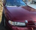 Красный Мазда 626, объемом двигателя 1.8 л и пробегом 370 тыс. км за 640 $, фото 1 на Automoto.ua