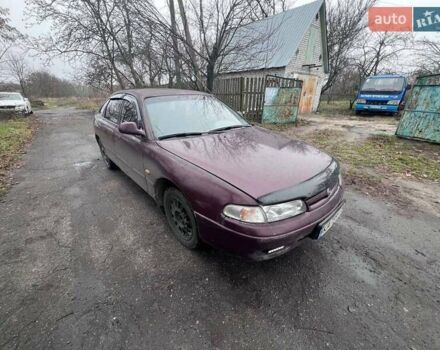 Красный Мазда 626, объемом двигателя 2 л и пробегом 413 тыс. км за 1500 $, фото 1 на Automoto.ua