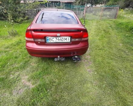Красный Мазда 626, объемом двигателя 1.8 л и пробегом 180 тыс. км за 1100 $, фото 4 на Automoto.ua