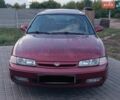 Красный Мазда 626, объемом двигателя 2 л и пробегом 408 тыс. км за 1499 $, фото 1 на Automoto.ua