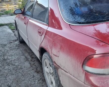 Червоний Мазда 626, об'ємом двигуна 2 л та пробігом 999 тис. км за 2000 $, фото 4 на Automoto.ua