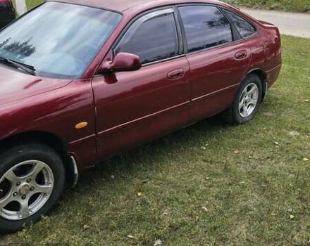 Красный Мазда 626, объемом двигателя 2 л и пробегом 455 тыс. км за 2000 $, фото 7 на Automoto.ua