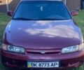 Красный Мазда 626, объемом двигателя 2 л и пробегом 450 тыс. км за 650 $, фото 1 на Automoto.ua