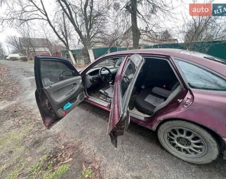 Красный Мазда 626, объемом двигателя 2 л и пробегом 413 тыс. км за 1500 $, фото 6 на Automoto.ua