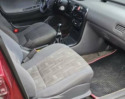 Красный Мазда 626, объемом двигателя 2 л и пробегом 455 тыс. км за 2000 $, фото 1 на Automoto.ua