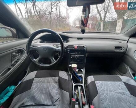 Красный Мазда 626, объемом двигателя 2 л и пробегом 413 тыс. км за 1500 $, фото 17 на Automoto.ua