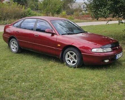 Красный Мазда 626, объемом двигателя 2 л и пробегом 455 тыс. км за 2000 $, фото 4 на Automoto.ua