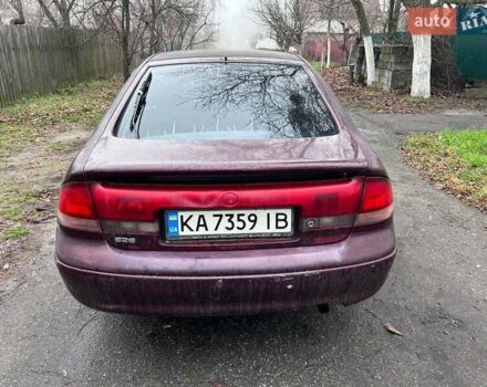 Красный Мазда 626, объемом двигателя 2 л и пробегом 413 тыс. км за 1500 $, фото 7 на Automoto.ua