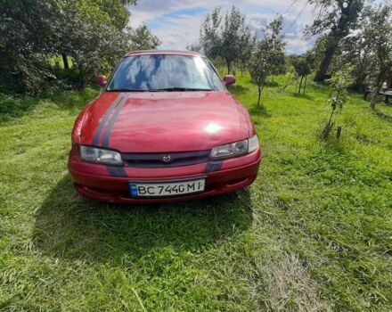 Красный Мазда 626, объемом двигателя 1.8 л и пробегом 180 тыс. км за 1100 $, фото 1 на Automoto.ua