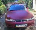Красный Мазда 626, объемом двигателя 1.8 л и пробегом 370 тыс. км за 1700 $, фото 1 на Automoto.ua