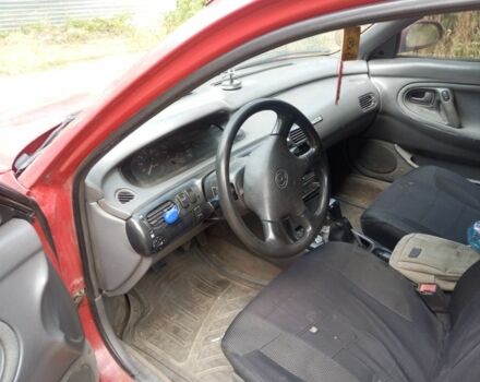 Красный Мазда 626, объемом двигателя 1.8 л и пробегом 500 тыс. км за 1900 $, фото 1 на Automoto.ua