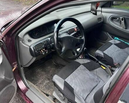 Красный Мазда 626, объемом двигателя 2 л и пробегом 413 тыс. км за 1500 $, фото 12 на Automoto.ua