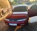 Красный Мазда 626, объемом двигателя 1.8 л и пробегом 250 тыс. км за 1800 $, фото 1 на Automoto.ua