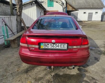 Красный Мазда 626, объемом двигателя 2 л и пробегом 364 тыс. км за 600 $, фото 1 на Automoto.ua