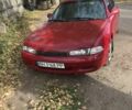 Красный Мазда 626, объемом двигателя 1.8 л и пробегом 100 тыс. км за 1600 $, фото 1 на Automoto.ua