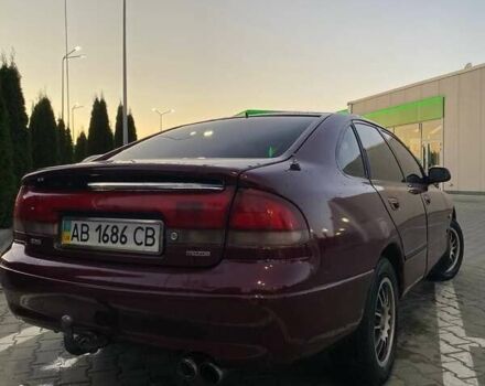 Красный Мазда 626, объемом двигателя 2 л и пробегом 323 тыс. км за 2700 $, фото 2 на Automoto.ua