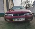 Красный Мазда 626, объемом двигателя 2 л и пробегом 364 тыс. км за 600 $, фото 1 на Automoto.ua