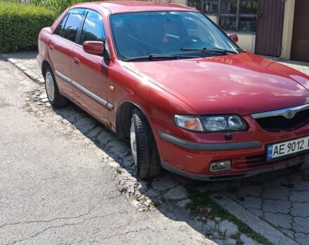 Красный Мазда 626, объемом двигателя 2 л и пробегом 400 тыс. км за 2200 $, фото 2 на Automoto.ua