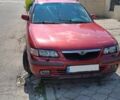 Красный Мазда 626, объемом двигателя 2 л и пробегом 400 тыс. км за 2200 $, фото 1 на Automoto.ua