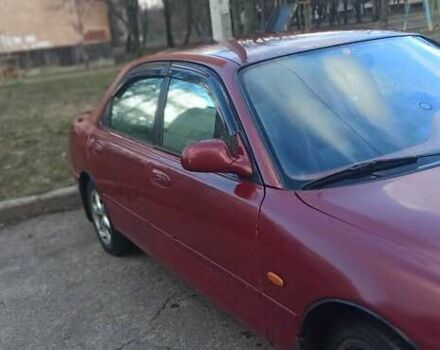 Красный Мазда 626, объемом двигателя 2 л и пробегом 45 тыс. км за 2500 $, фото 4 на Automoto.ua
