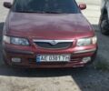 Красный Мазда 626, объемом двигателя 1.8 л и пробегом 400 тыс. км за 3300 $, фото 1 на Automoto.ua