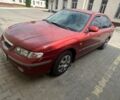 Красный Мазда 626, объемом двигателя 1.8 л и пробегом 550 тыс. км за 2200 $, фото 1 на Automoto.ua