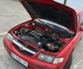 Червоний Мазда 626, об'ємом двигуна 1.99 л та пробігом 300 тис. км за 3200 $, фото 12 на Automoto.ua