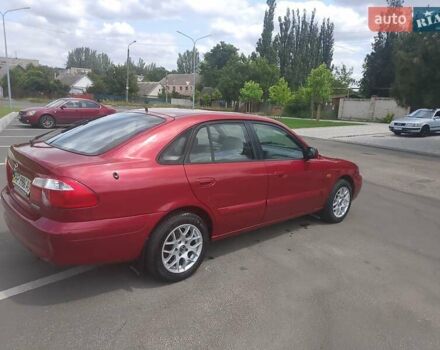 Червоний Мазда 626, об'ємом двигуна 1.8 л та пробігом 160 тис. км за 2600 $, фото 7 на Automoto.ua