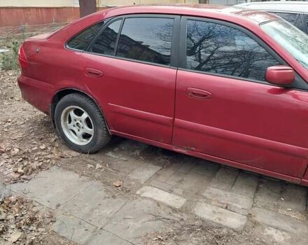 Красный Мазда 626, объемом двигателя 2 л и пробегом 246 тыс. км за 3700 $, фото 3 на Automoto.ua