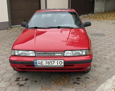 Червоний Мазда 626, об'ємом двигуна 2.2 л та пробігом 555 тис. км за 1375 $, фото 1 на Automoto.ua