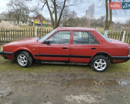 Красный Мазда 626, объемом двигателя 2 л и пробегом 346 тыс. км за 1400 $, фото 1 на Automoto.ua