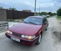 Красный Мазда 626, объемом двигателя 2 л и пробегом 200 тыс. км за 350 $, фото 1 на Automoto.ua