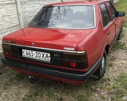 Красный Мазда 626, объемом двигателя 2 л и пробегом 999 тыс. км за 700 $, фото 1 на Automoto.ua