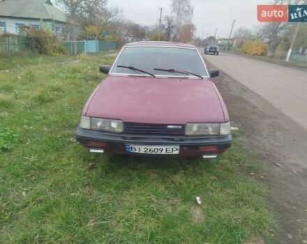 Красный Мазда 626, объемом двигателя 2 л и пробегом 300 тыс. км за 1000 $, фото 1 на Automoto.ua