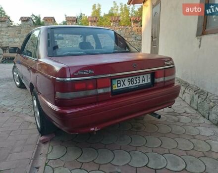 Красный Мазда 626, объемом двигателя 1.8 л и пробегом 111 тыс. км за 800 $, фото 1 на Automoto.ua