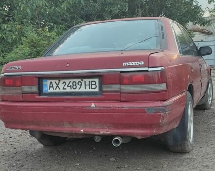 Червоний Мазда 626, об'ємом двигуна 1.8 л та пробігом 390 тис. км за 500 $, фото 1 на Automoto.ua