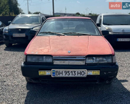 Красный Мазда 626, объемом двигателя 1.8 л и пробегом 300 тыс. км за 650 $, фото 1 на Automoto.ua